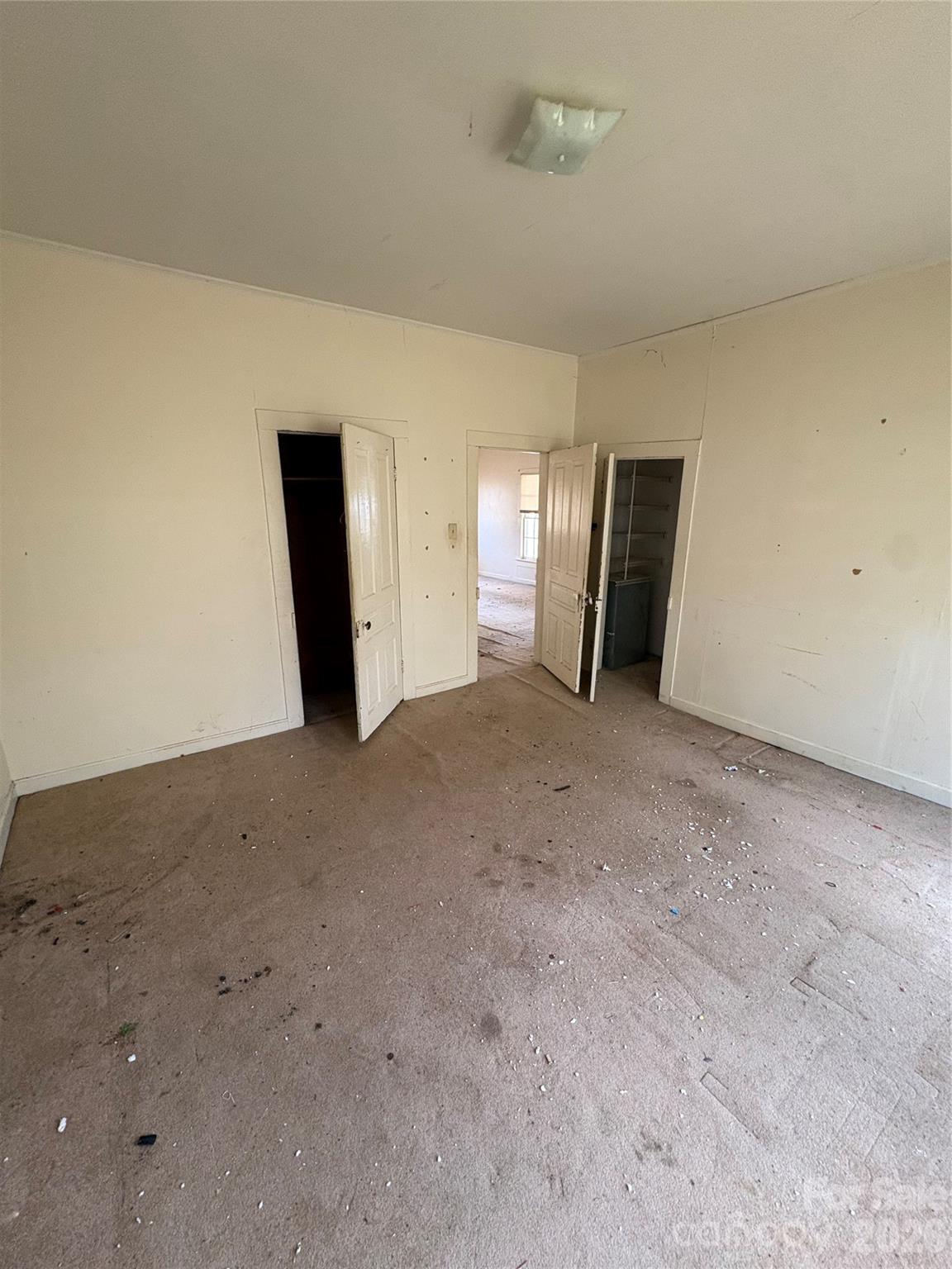 113 Davie Street Cooleemee, NC 27014 - Photo 9 of 14 a view of a livingroom with an empty space