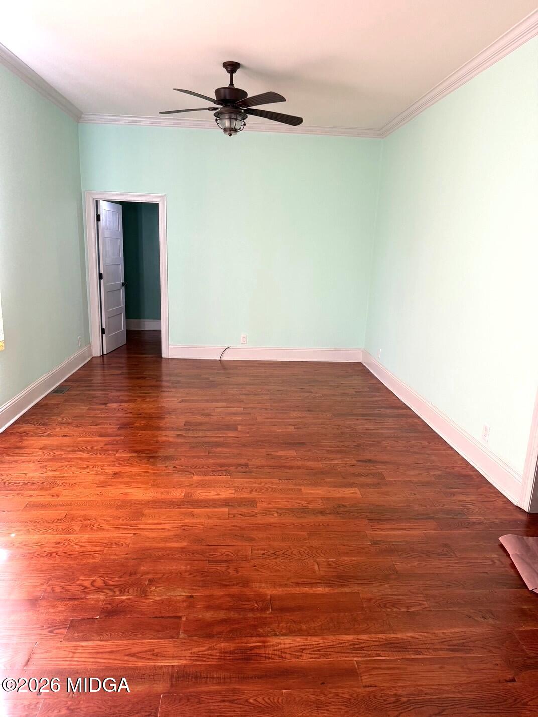 988 New Street Macon, GA 31201 - Photo 5 of 9 a view of empty room with wooden floor