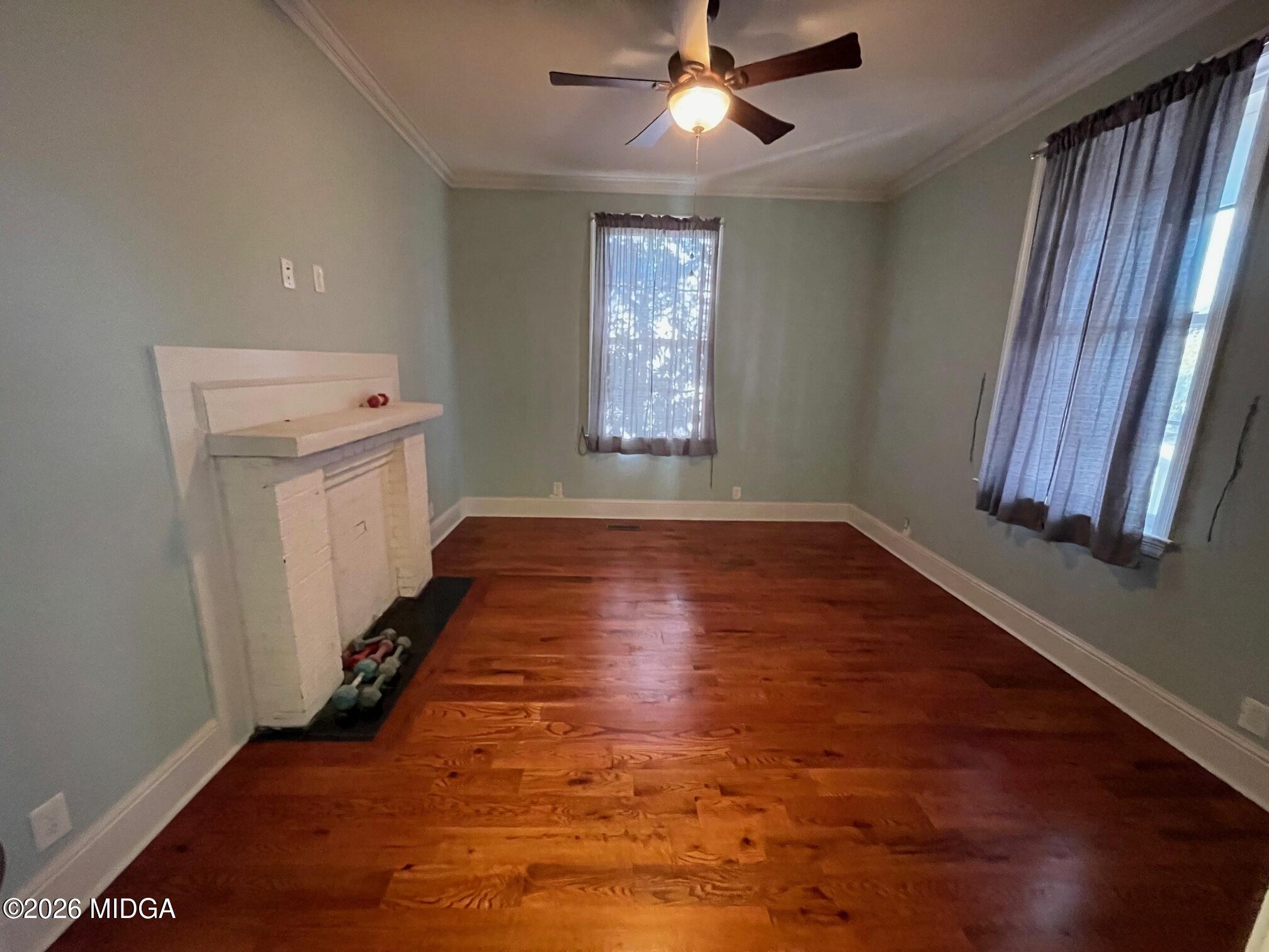 988 New Street Macon, GA 31201 - Photo 8 of 9 wooden floor in an empty room with a window