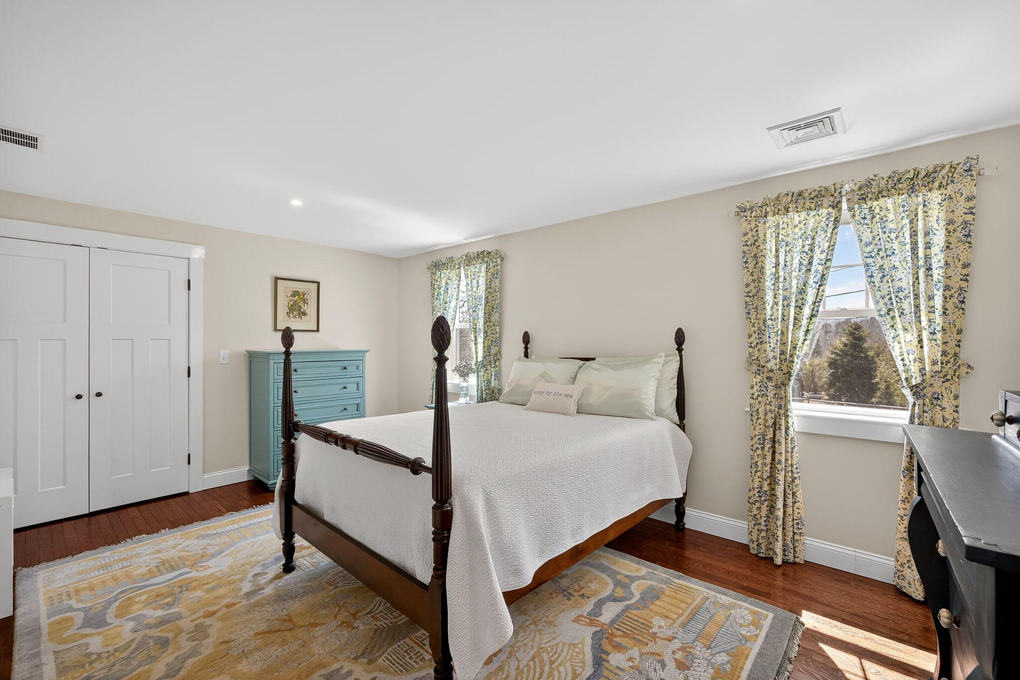 176 Bumps River Road Osterville, MA 02655 - Photo 32 of 54 a bed room with a bed and a window