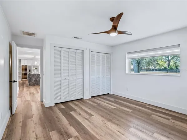 a view of outdoor space and wooden floor
