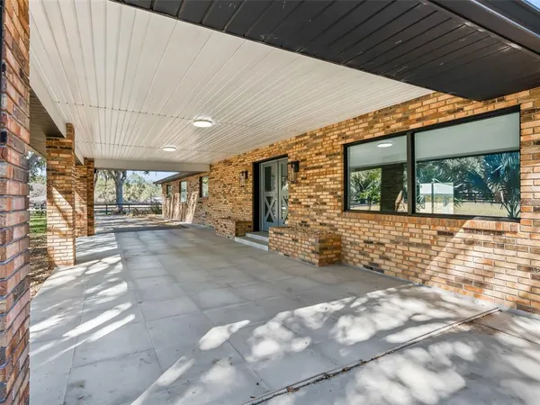 a kitchen with appliances and cabinets