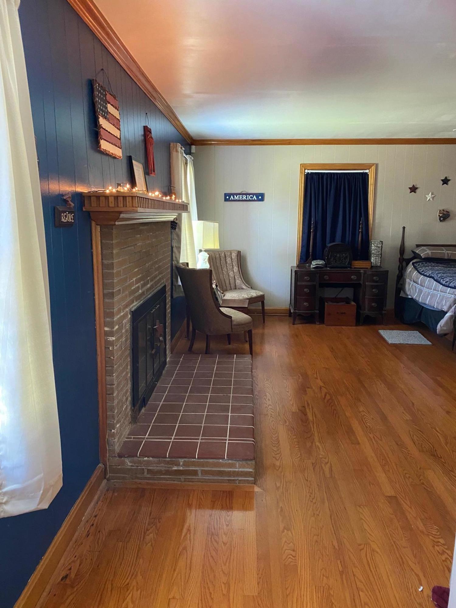 1336 George Malone Road Greeneville, TN 37745 - Photo 26 of 32 Castle Fireplace Master Bedroom