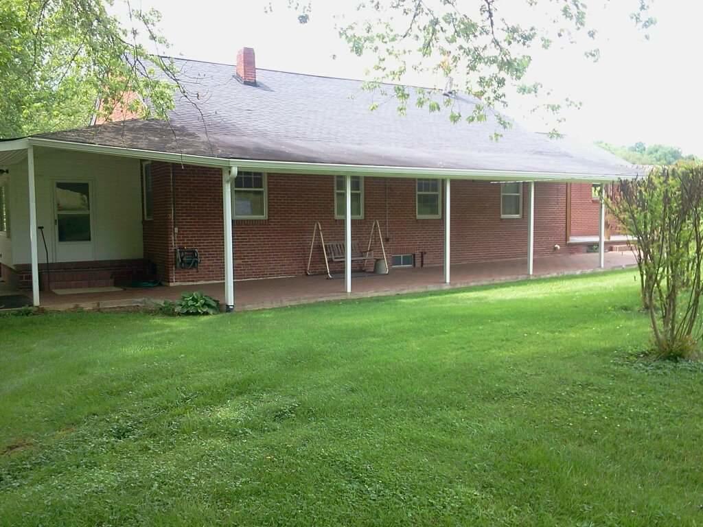 1336 George Malone Road Greeneville, TN 37745 - Photo 5 of 32 Castle back porch