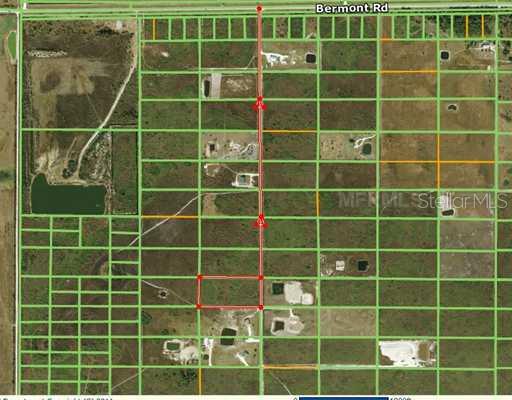 48469 Bermont Road Punta Gorda, FL 33982 - Photo 1 of 1 Aerial View - Note red line (the road) south of Bermont Rd (SR74) leads to property which is the red rectangle. Homesites next door and several lots south of this parcel. Sites created across the road also. Two home on road as you go south to the 5 acres.