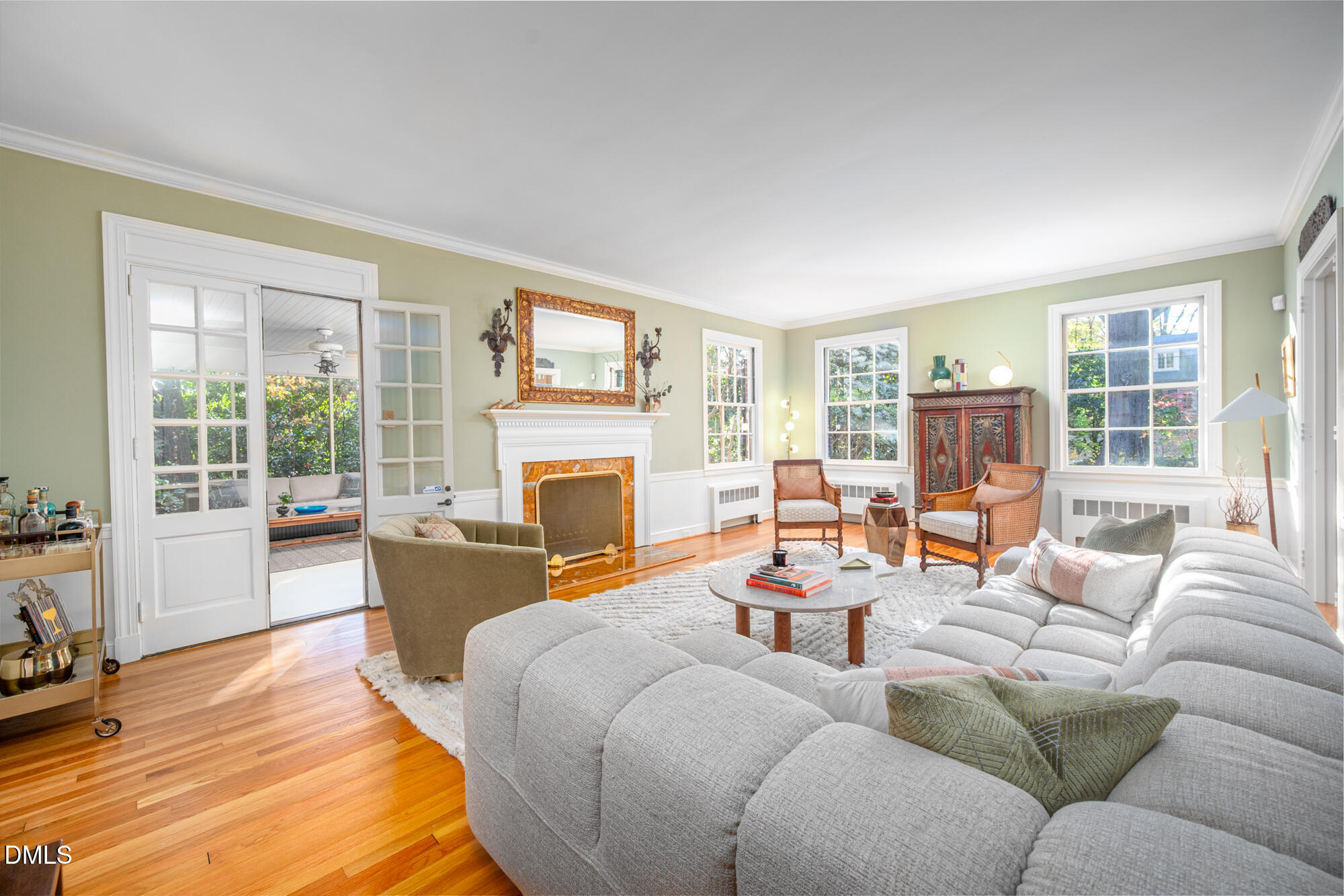 64 Beverly Drive Durham, NC 27707 - Photo 11 of 71 a living room with furniture large window and a fireplace