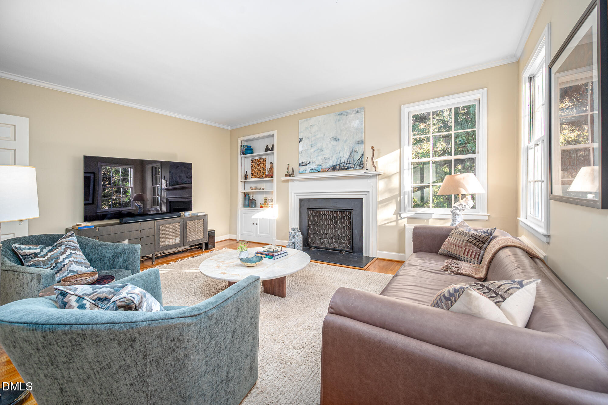 64 Beverly Drive Durham, NC 27707 - Photo 14 of 71 a living room with furniture and a fireplace