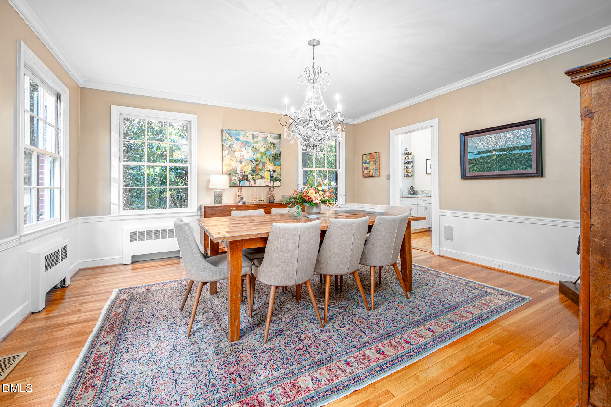 64 Beverly Drive Durham, NC 27707 - Photo 15 of 71 a view of a dining room with furniture window and wooden floor