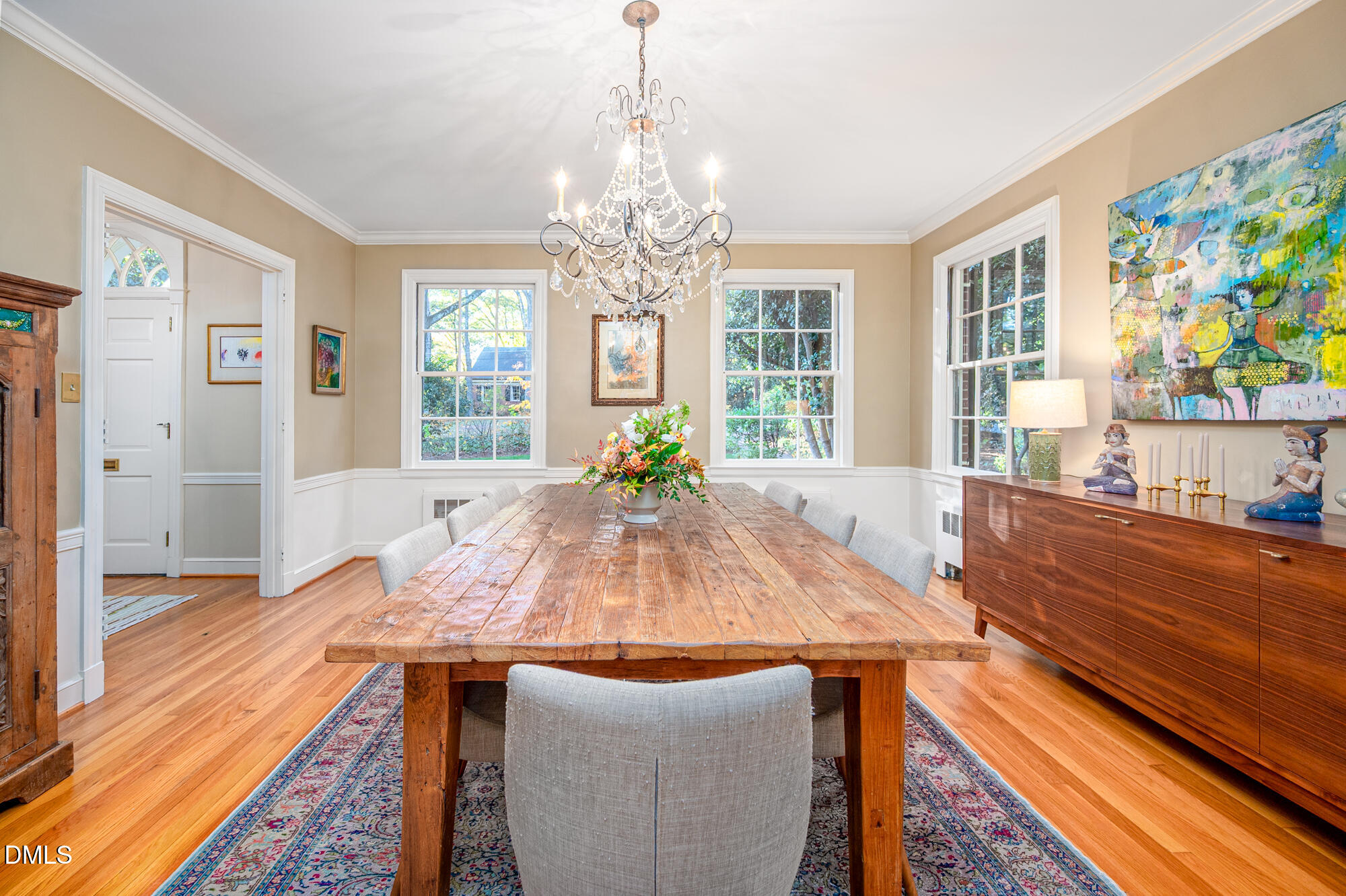 64 Beverly Drive Durham, NC 27707 - Photo 17 of 71 a view of a dining room with furniture a chandelier and wooden floor
