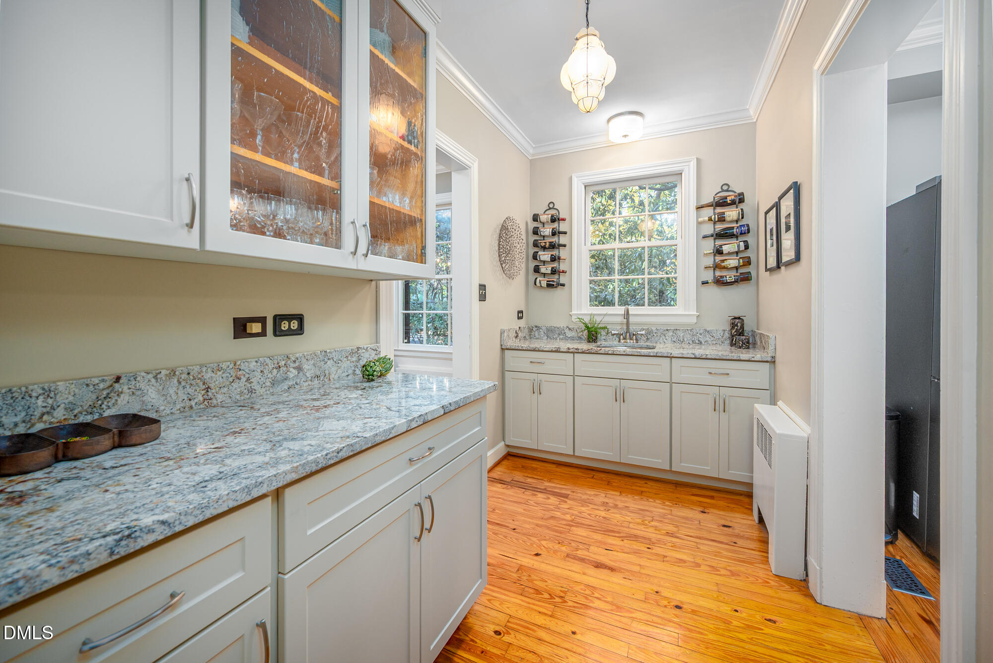 64 Beverly Drive Durham, NC 27707 - Photo 18 of 71 a kitchen with granite countertop a sink stainless steel appliances and cabinets