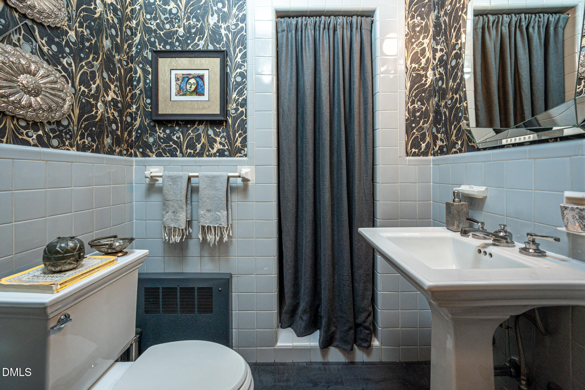 64 Beverly Drive Durham, NC 27707 - Photo 23 of 71 a bathroom with a toilet sink and mirror