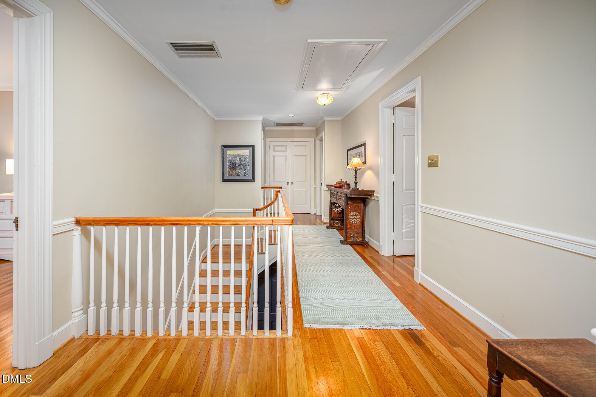 64 Beverly Drive Durham, NC 27707 - Photo 25 of 71 a view of a hallway with wooden floor and furniture