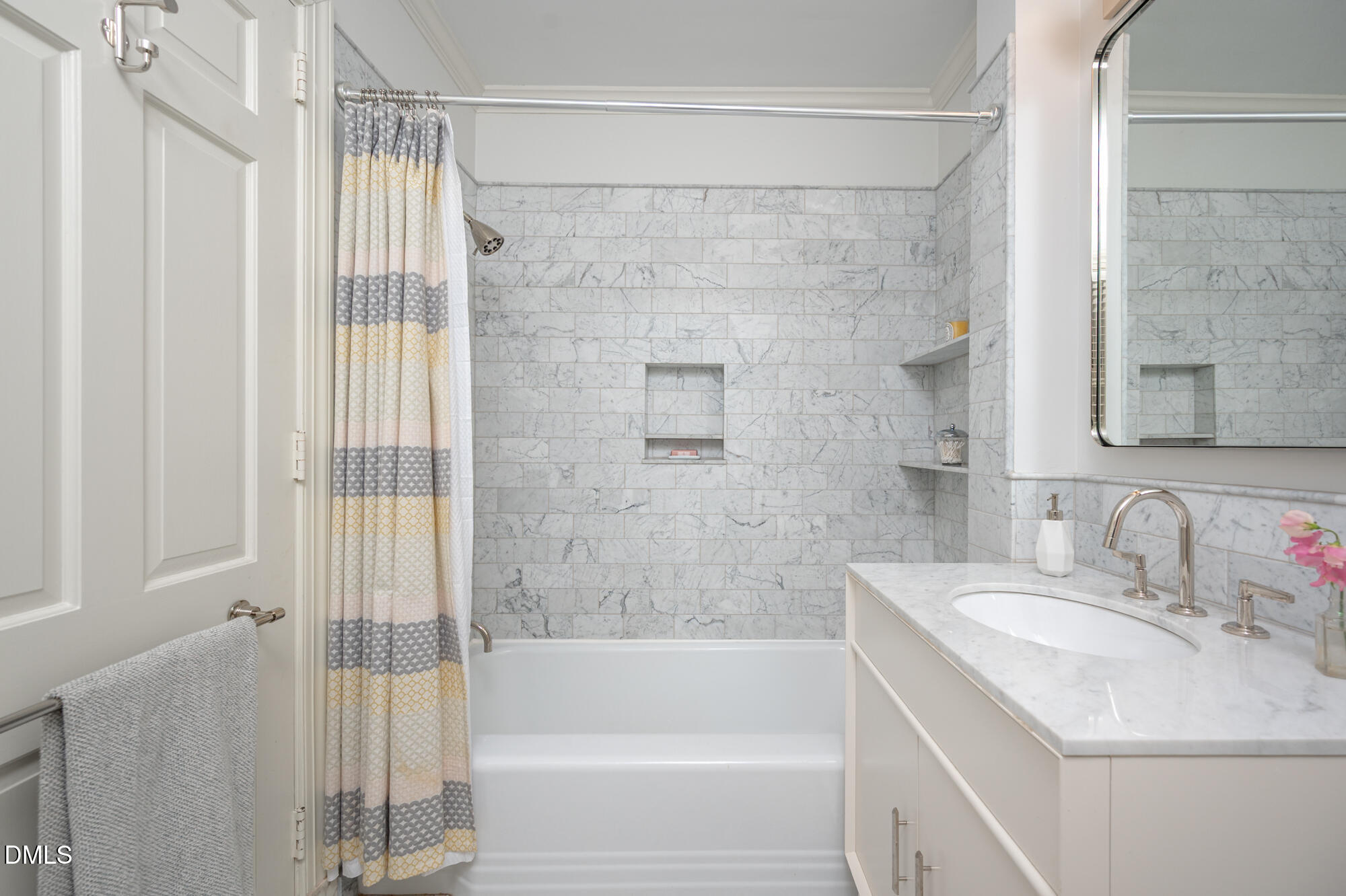 64 Beverly Drive Durham, NC 27707 - Photo 29 of 71 a bathroom with a sink and a mirror