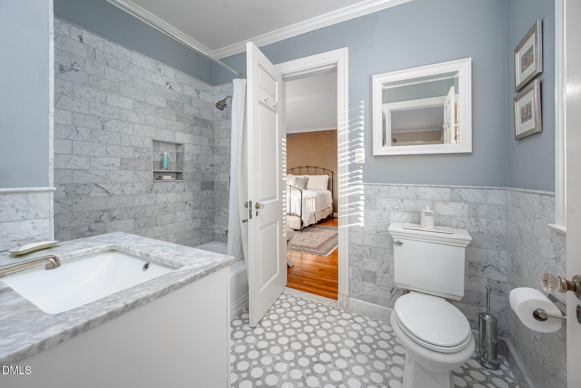64 Beverly Drive Durham, NC 27707 - Photo 32 of 71 a bathroom with a granite countertop toilet a sink and a bathtub