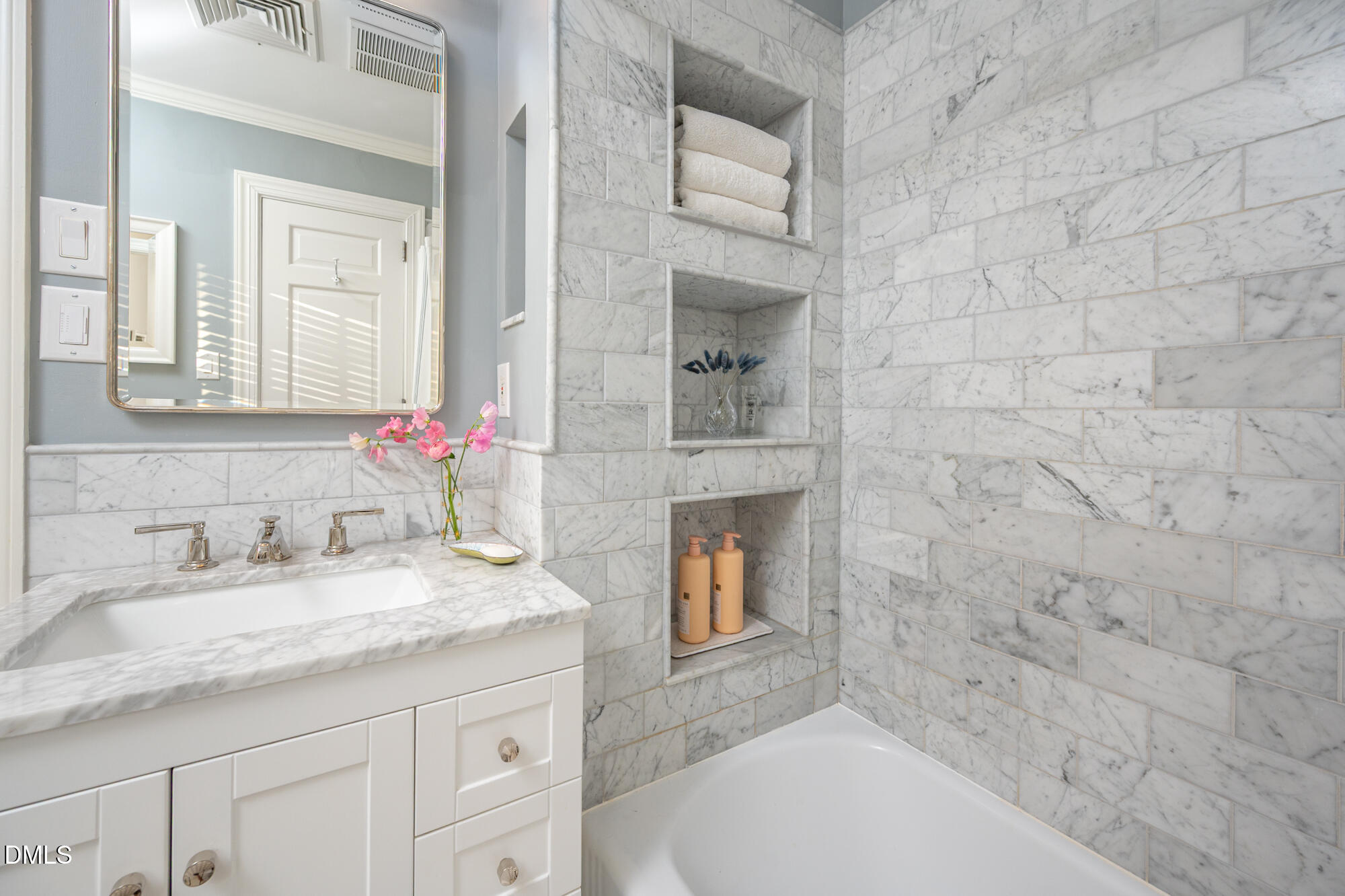 64 Beverly Drive Durham, NC 27707 - Photo 34 of 71 a bathroom with a granite countertop sink a mirror and a shower