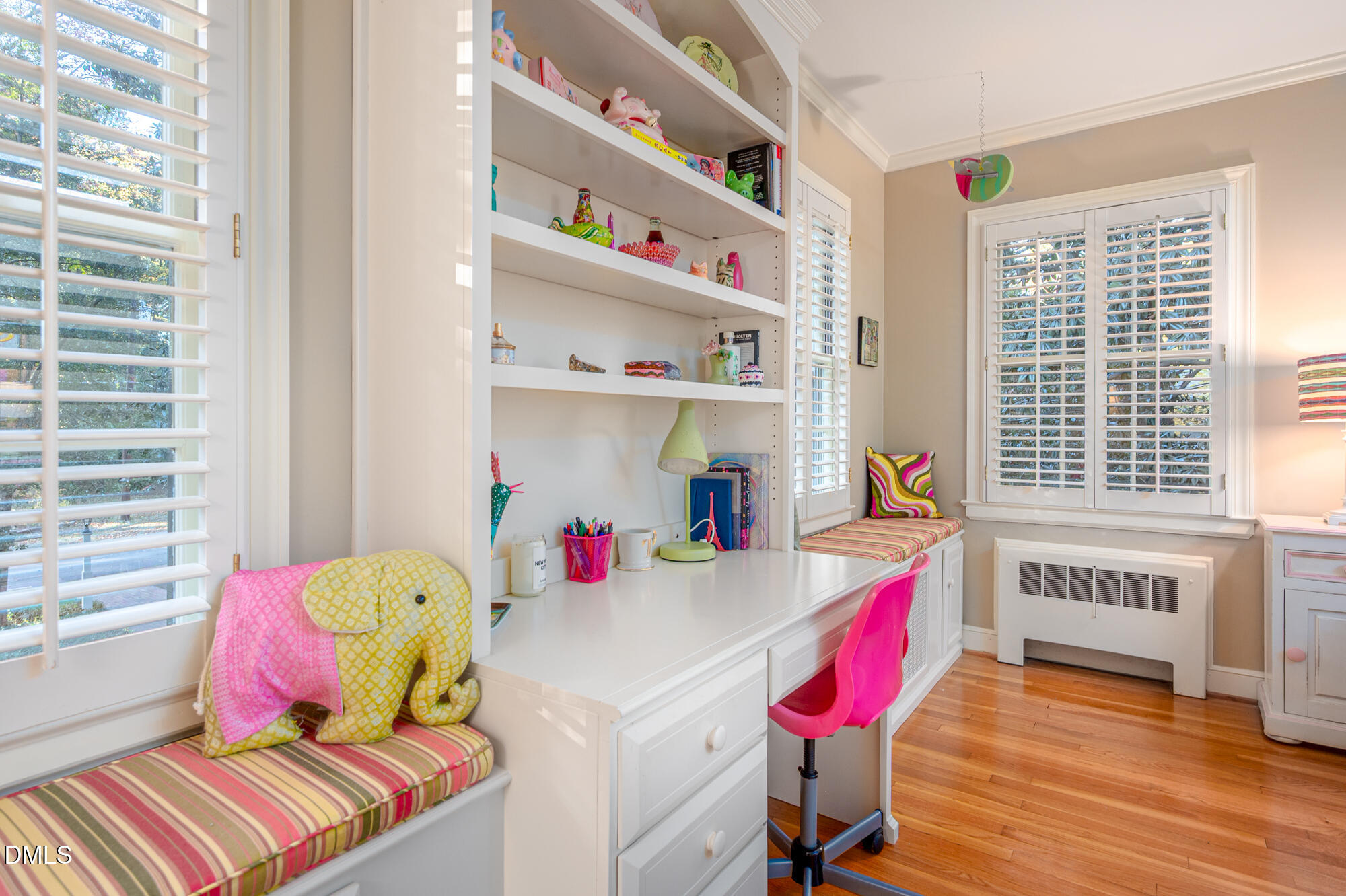 64 Beverly Drive Durham, NC 27707 - Photo 38 of 71 a living room with furniture and a wooden floor