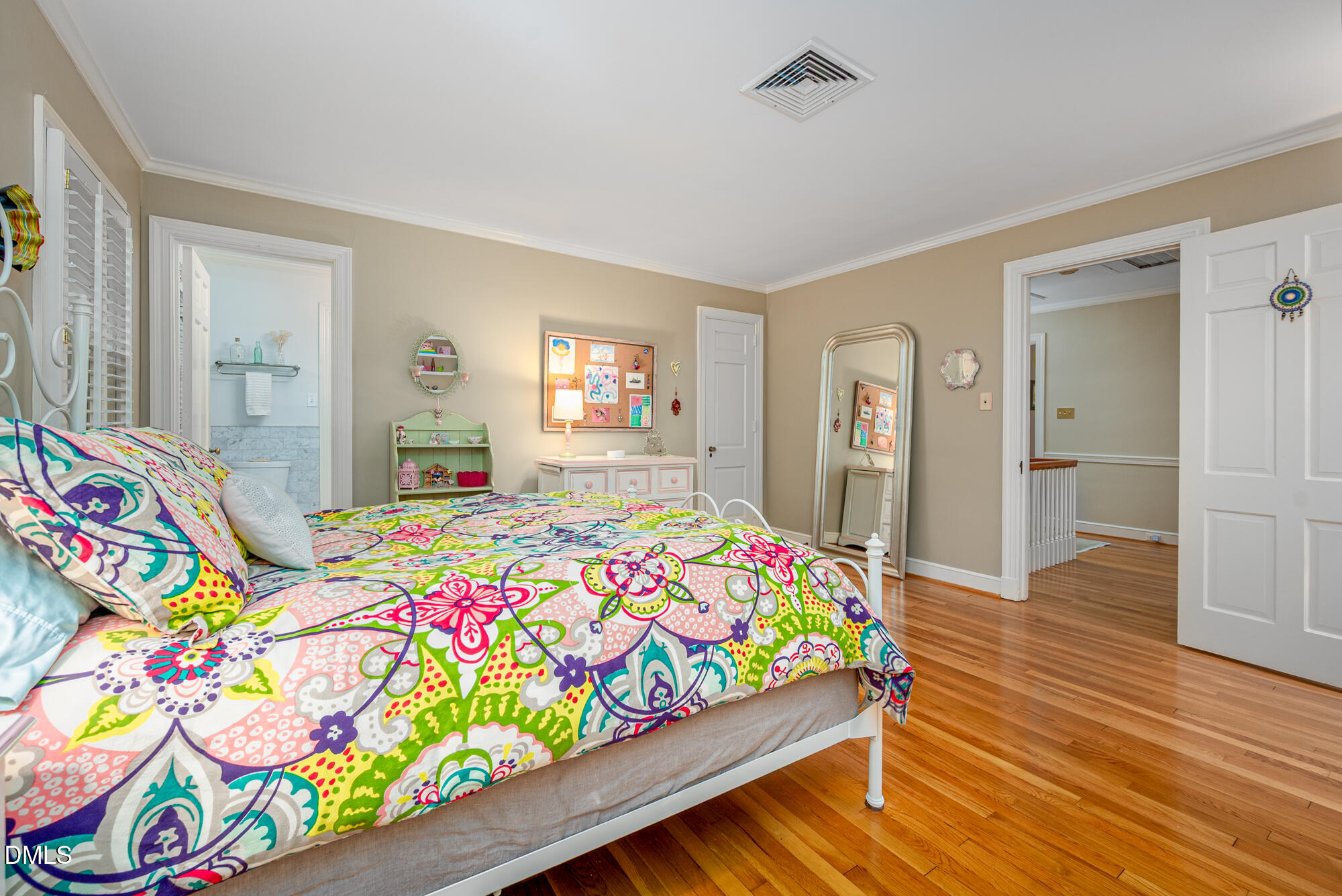 64 Beverly Drive Durham, NC 27707 - Photo 39 of 71 a bedroom that has a bed and a dresser in it