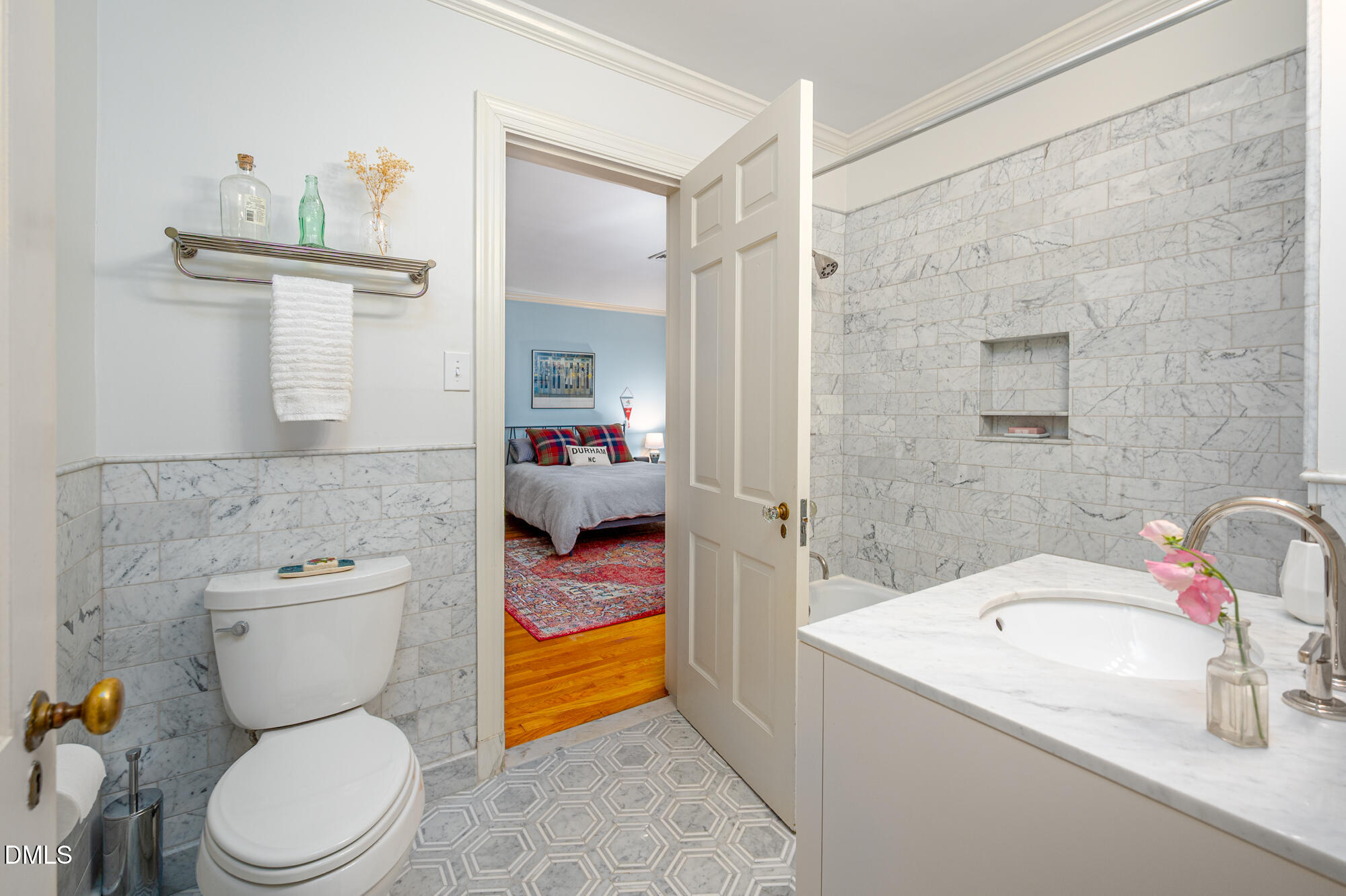 64 Beverly Drive Durham, NC 27707 - Photo 40 of 71 a bathroom with a sink a toilet and shower