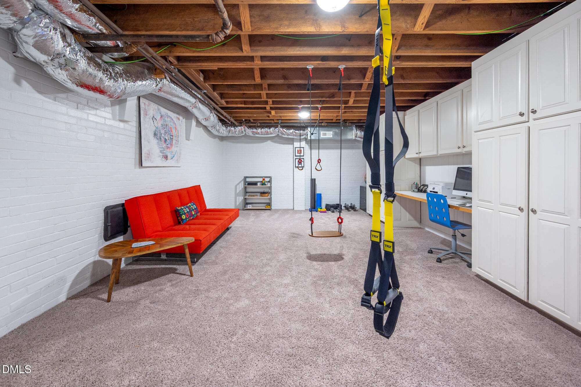 64 Beverly Drive Durham, NC 27707 - Photo 46 of 71 Lower Level Lounge Area