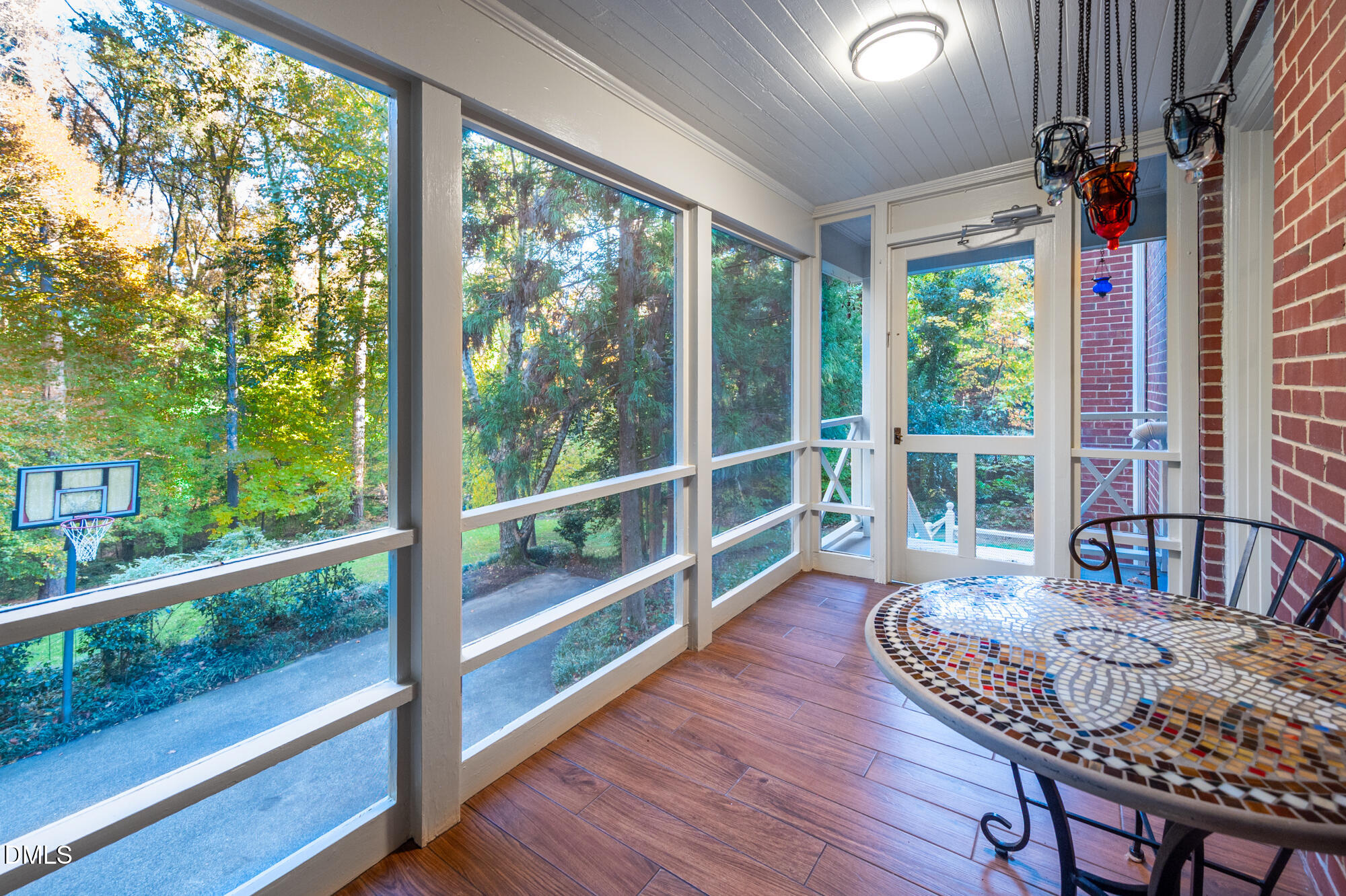 64 Beverly Drive Durham, NC 27707 - Photo 52 of 71 a view of a room with wooden floor and windows
