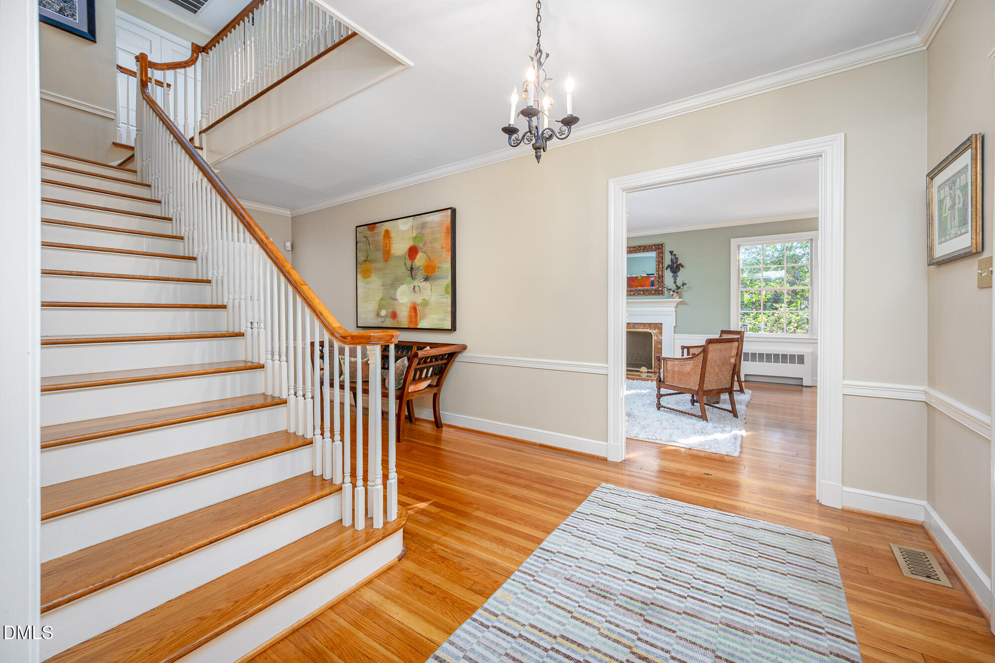 64 Beverly Drive Durham, NC 27707 - Photo 7 of 71 a view of a livingroom with wooden floor and stairs