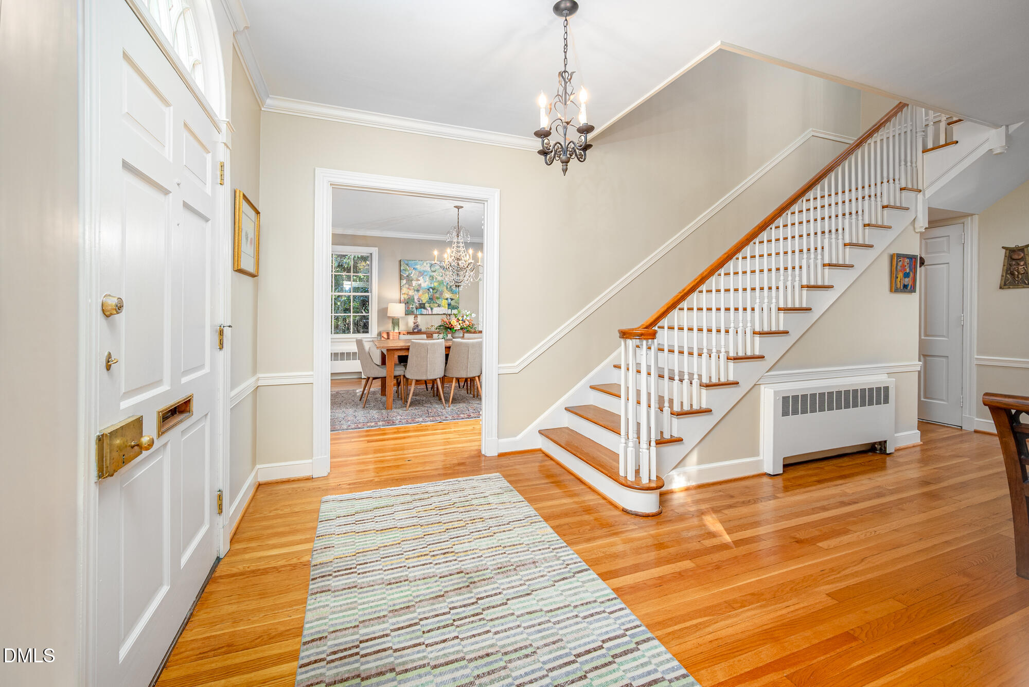 64 Beverly Drive Durham, NC 27707 - Photo 8 of 71 a view of a hallway with wooden floor and staircase