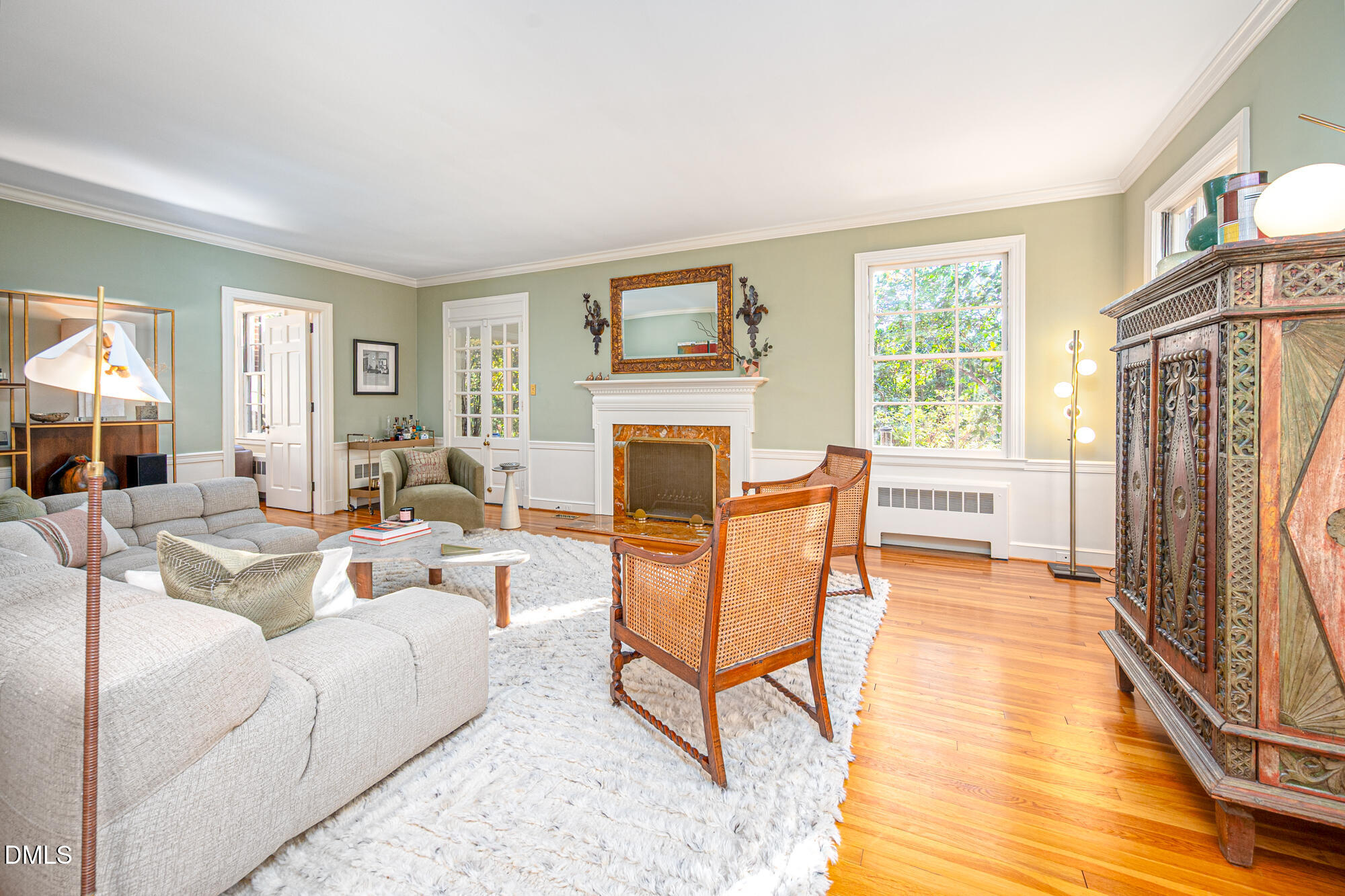 64 Beverly Drive Durham, NC 27707 - Photo 9 of 71 a living room with fireplace furniture and a flat screen tv