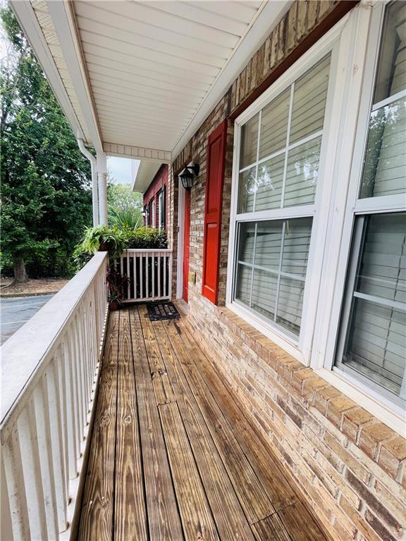 3607 Ginnis Road, Unit 2 Atlanta, GA 30331 - Photo 2 of 9 a view of a balcony with wooden floor