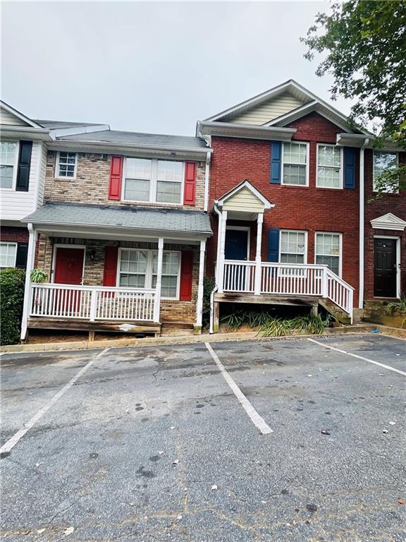 3607 Ginnis Road, Unit 2 Atlanta, GA 30331 - Photo 3 of 9 a front view of a house with a yard