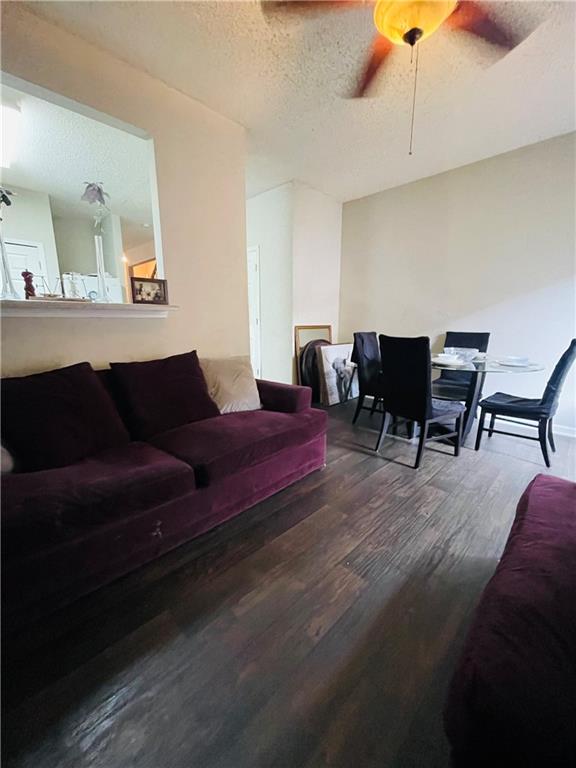 3607 Ginnis Road, Unit 2 Atlanta, GA 30331 - Photo 7 of 9 a living room with furniture and wooden floor