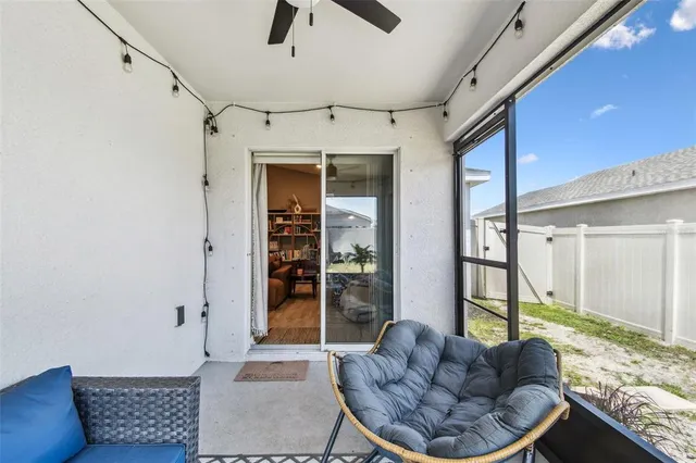 a living room with furniture and a window