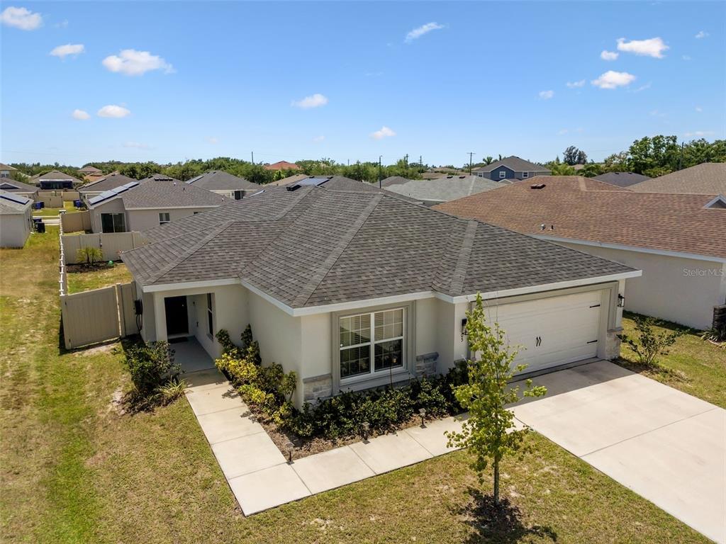 105 Blue Alice Spring Court Ruskin, FL 33570 - Photo 40 of 49 a view of a house with a patio