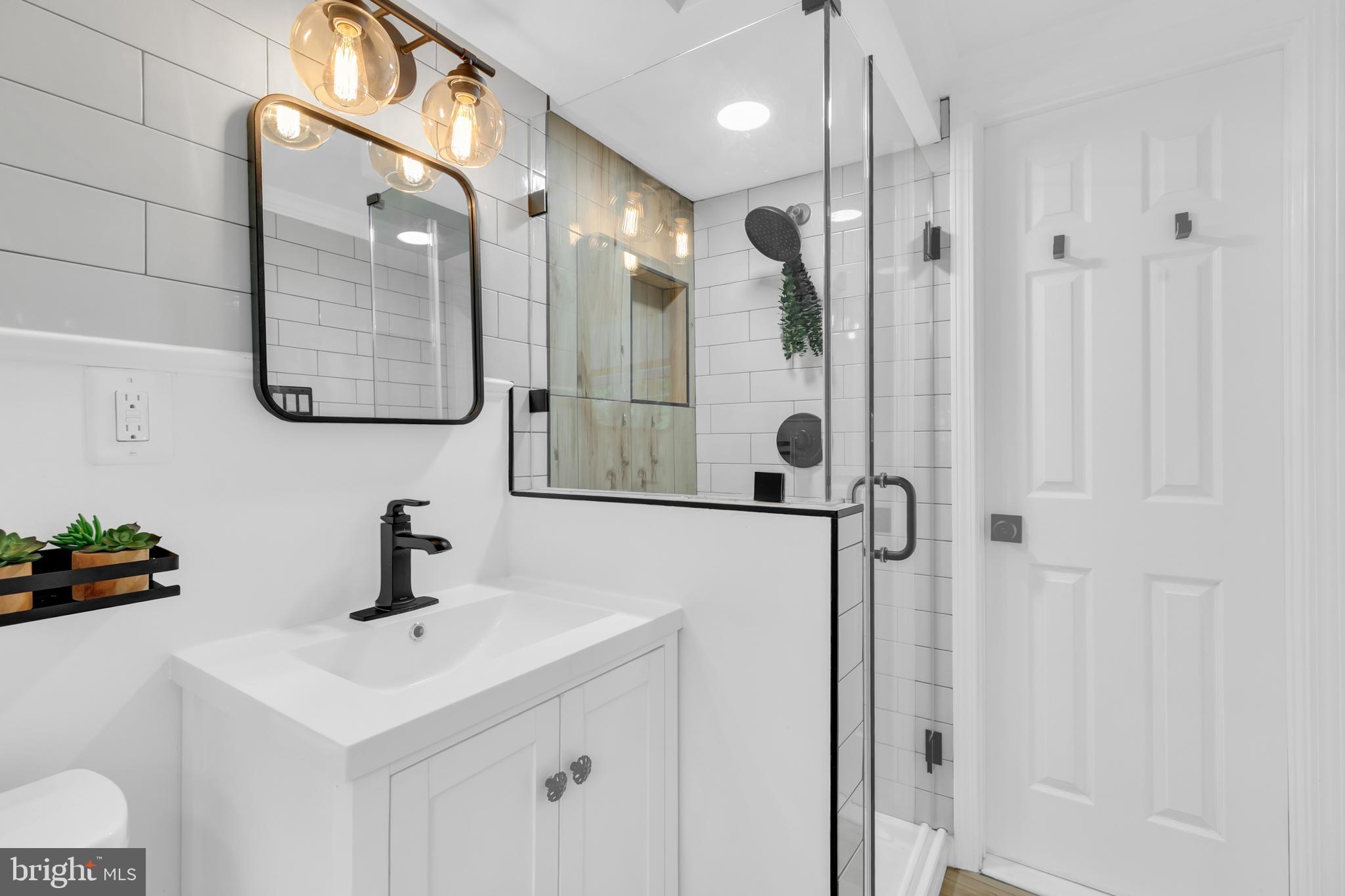 7517 Axton Street Springfield, VA 22151 - Photo 32 of 46 Lower level fully renovated bathroom