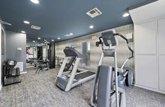 a view of a room with gym equipment