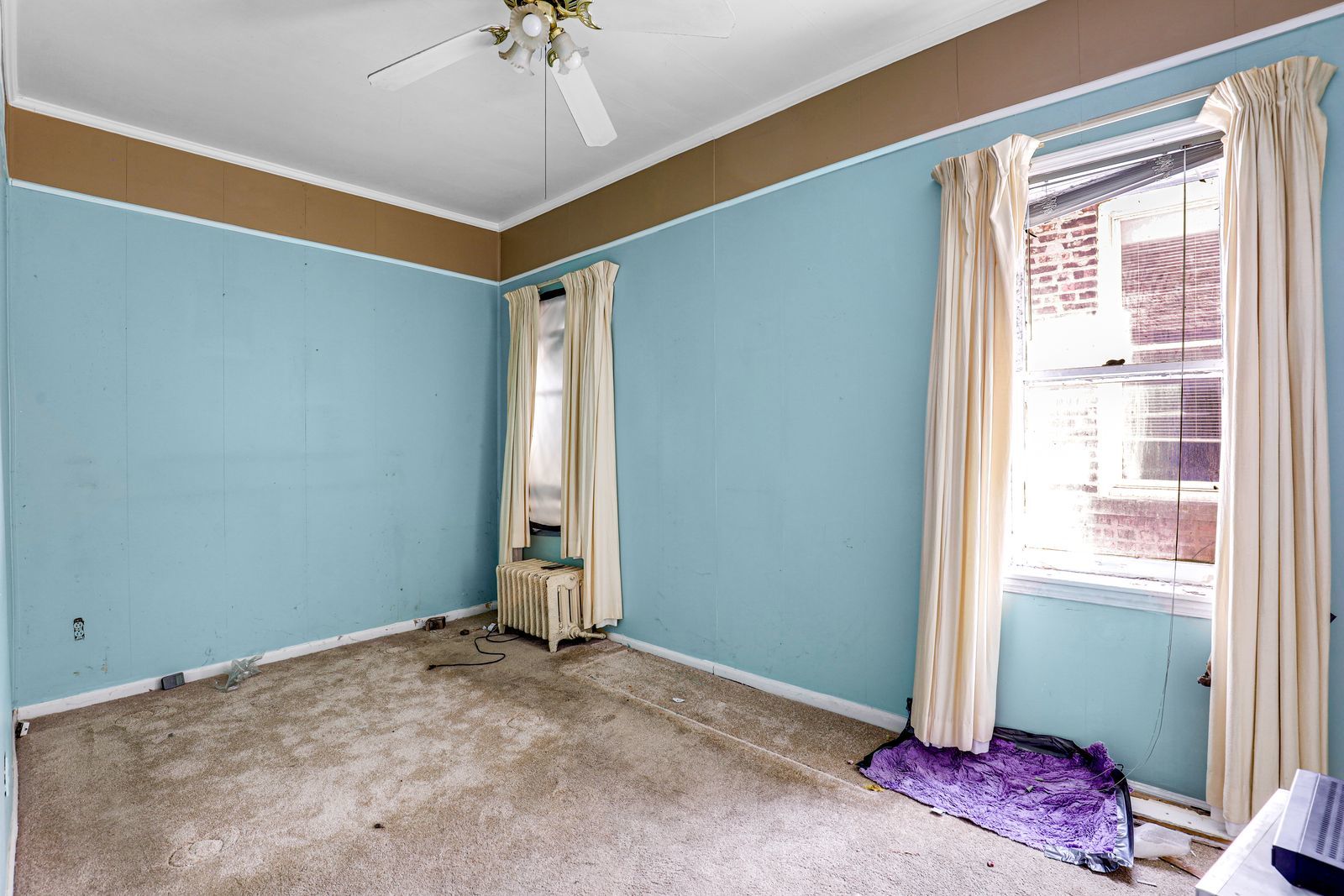 722 West Marquette Road Chicago, IL 60621 - Photo 10 of 47 a view of a room with window and a ceiling fan
