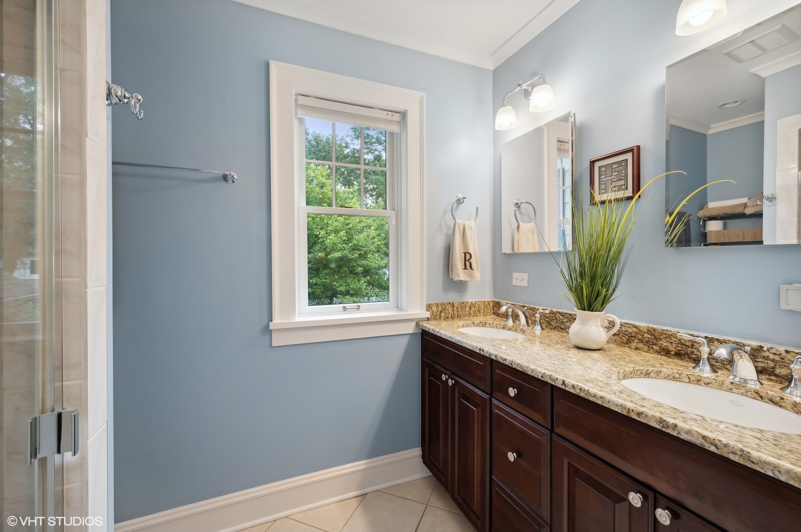 315 16th Street Wilmette, IL 60091 - Photo 17 of 31 a bathroom with a granite countertop double vanity sink and a mirror