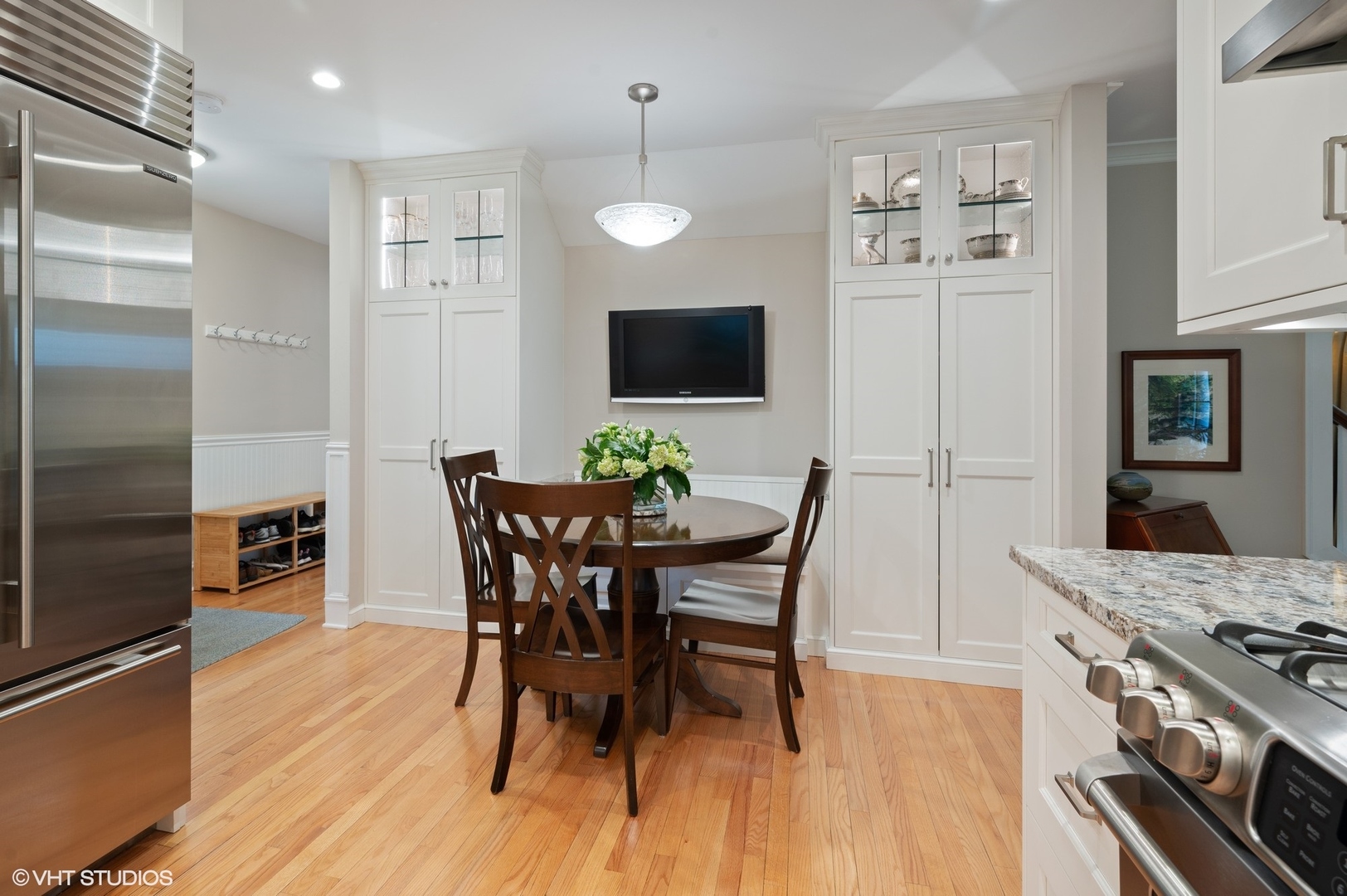 315 16th Street Wilmette, IL 60091 - Photo 7 of 31 a view of a dining room with furniture and wooden floor