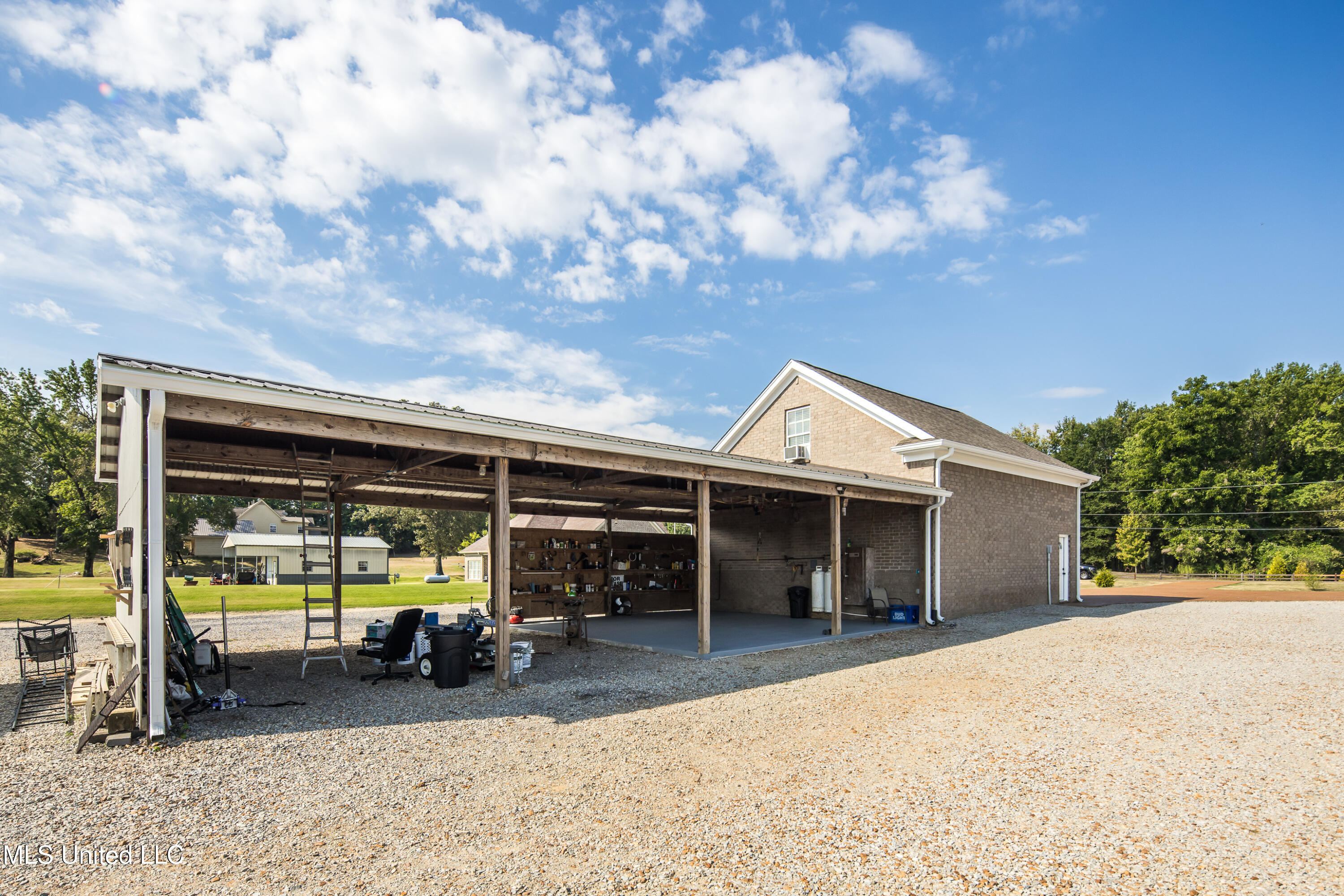 1778 Sunset Farms Drive Hernando, MS 38632 - Photo 50 of 64 Large open barn/carport w/concrete pad