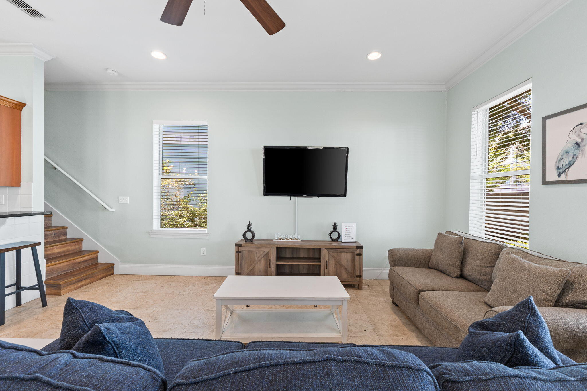 209 Grand Key Loop East Destin, FL 32541 - Photo 5 of 59 a living room with furniture and a flat screen tv