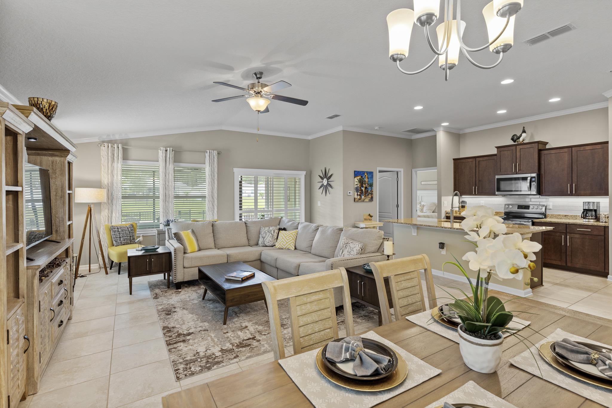 307 Palace Drive St. Augustine, FL 32084 - Photo 14 of 58 a living room with lots of furniture and view of kitchen