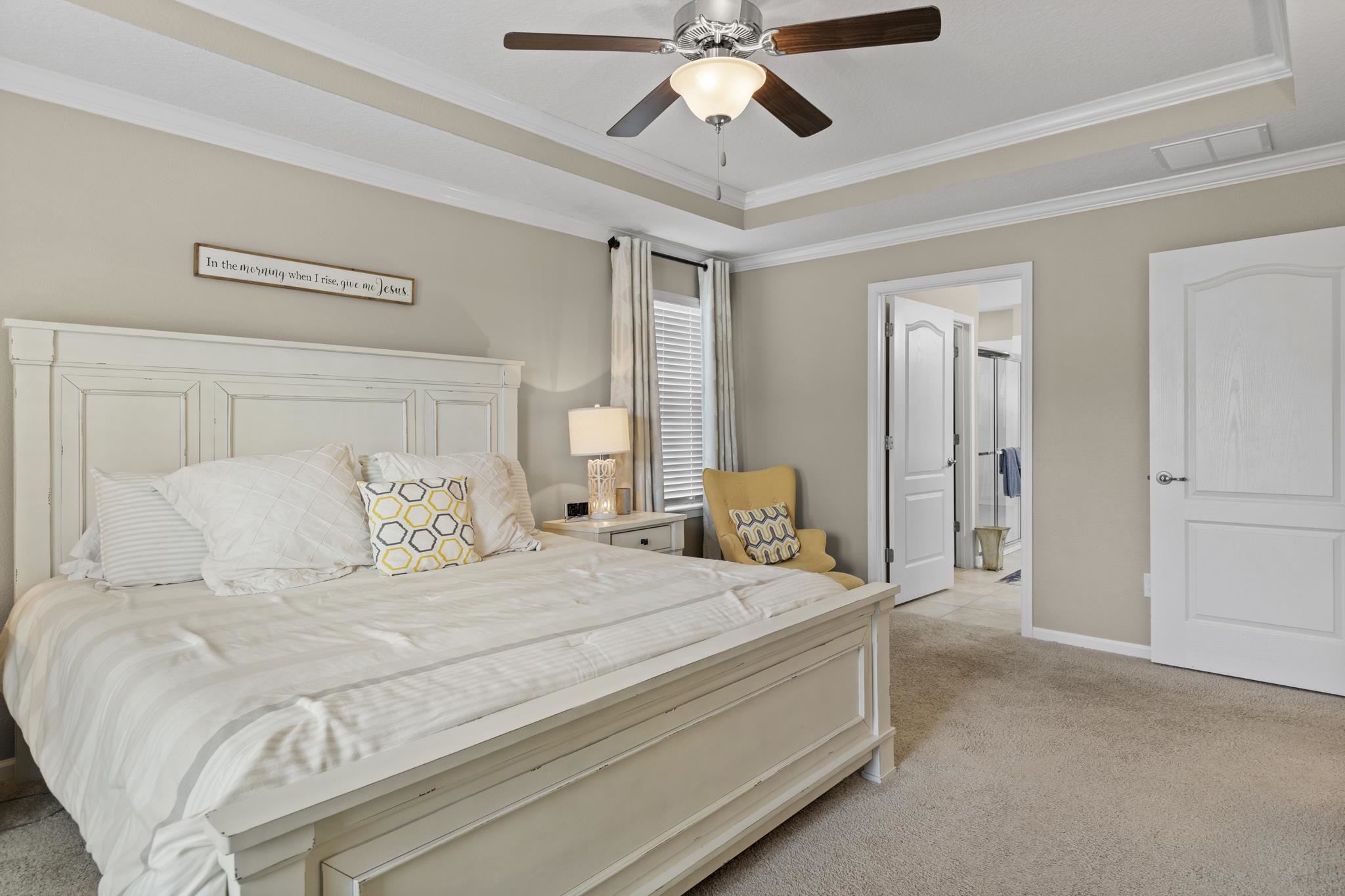 307 Palace Drive St. Augustine, FL 32084 - Photo 23 of 58 a bedroom with a bed and a chandelier