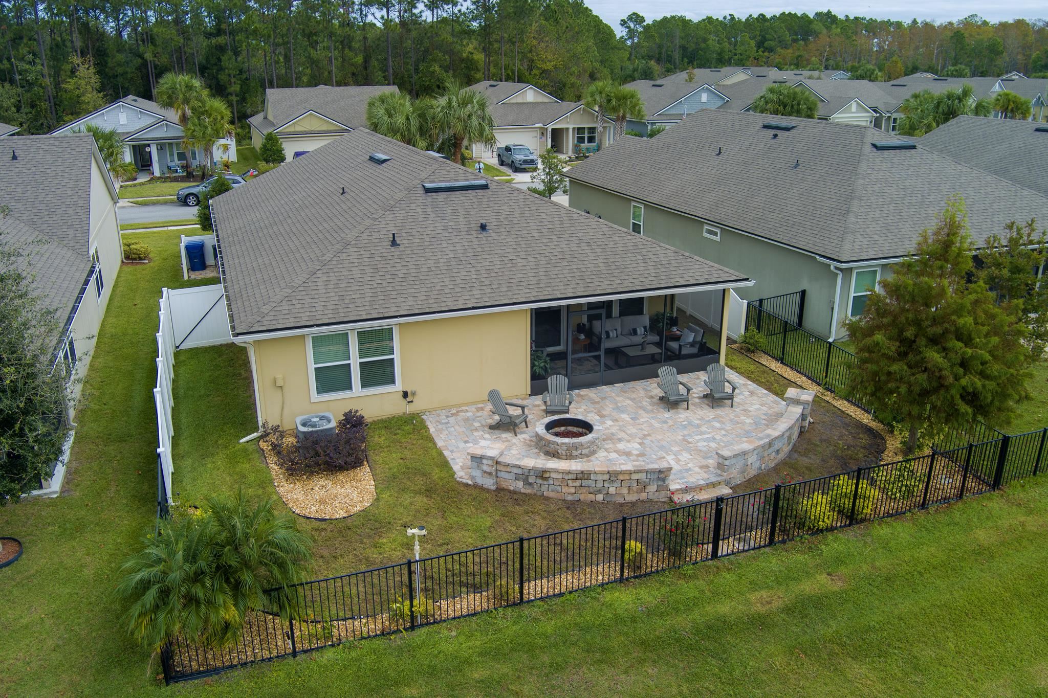 307 Palace Drive St. Augustine, FL 32084 - Photo 39 of 58 an aerial view of a house with table and chairs