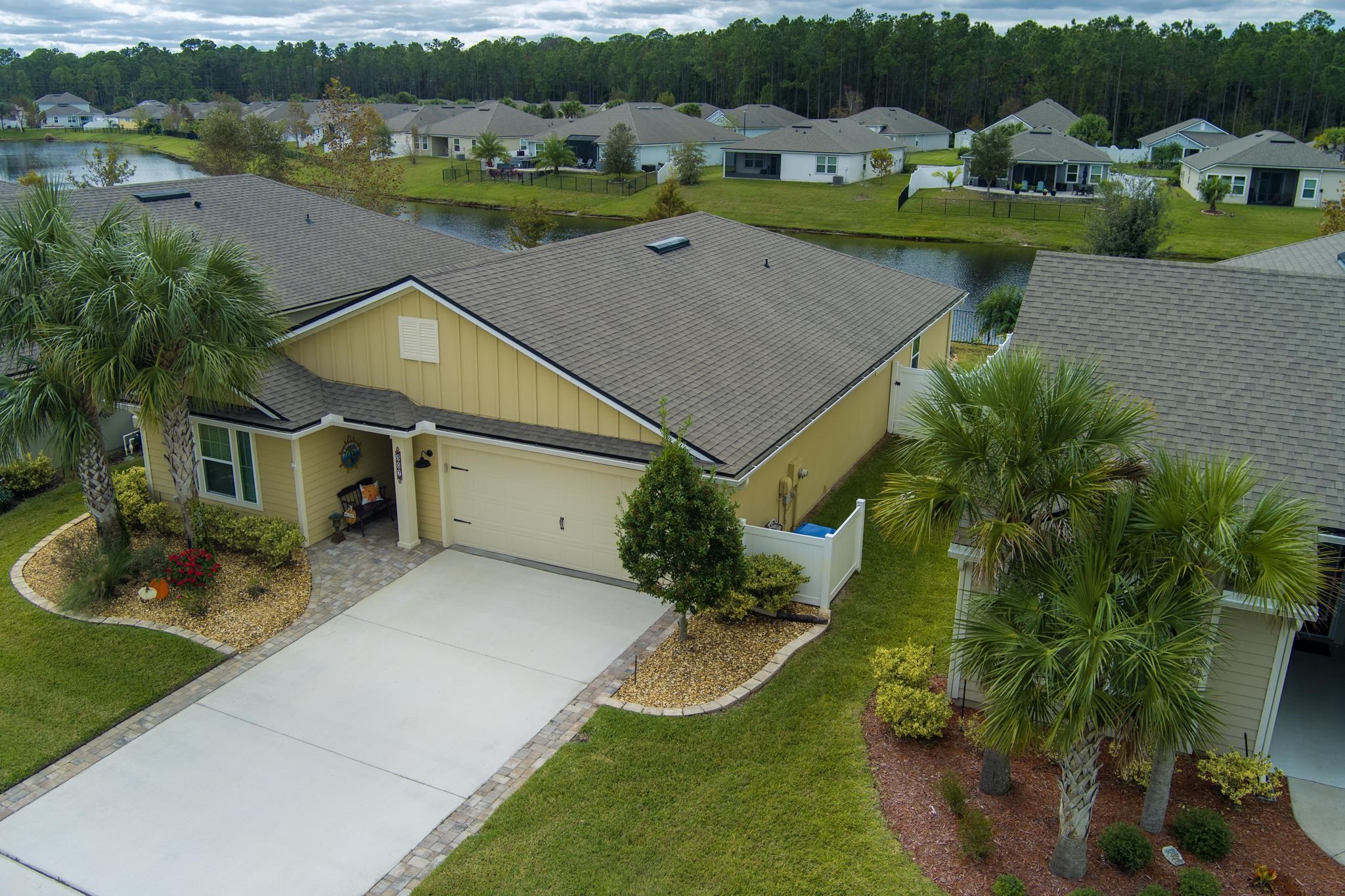 307 Palace Drive St. Augustine, FL 32084 - Photo 45 of 58 an aerial view of a house with outdoor space and lake view