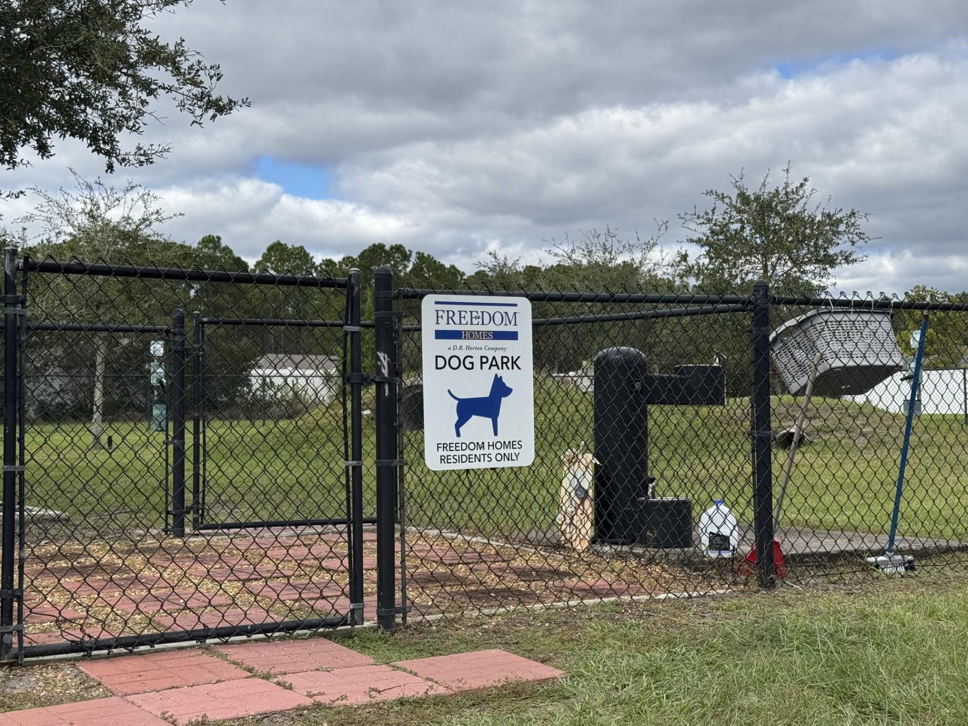 307 Palace Drive St. Augustine, FL 32084 - Photo 51 of 58 a view of a street with a sign on the side of the house