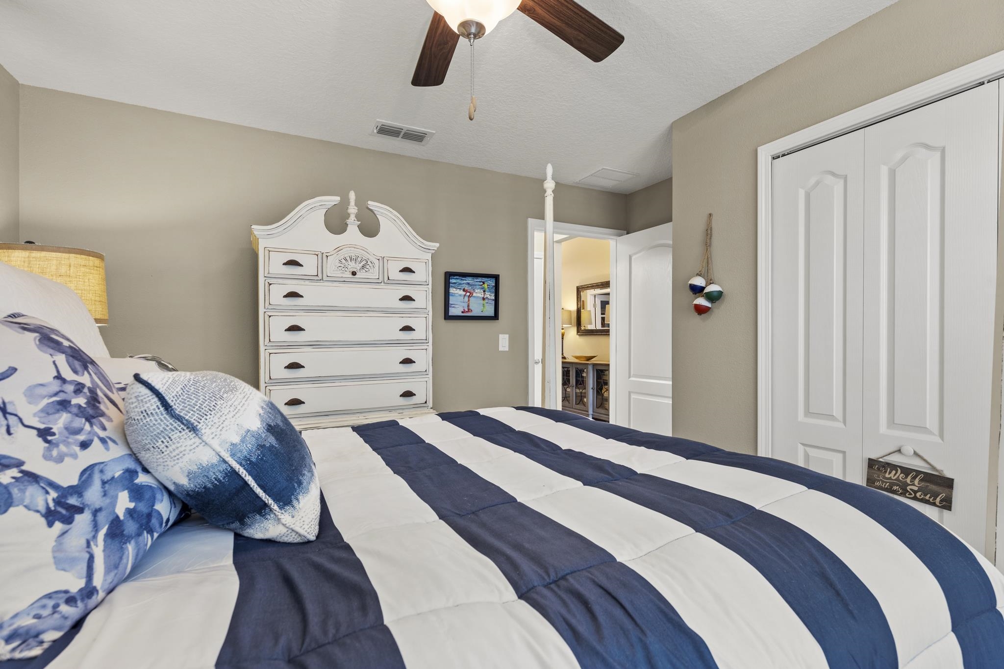 307 Palace Drive St. Augustine, FL 32084 - Photo 7 of 58 a bedroom with a bed and ceiling fan