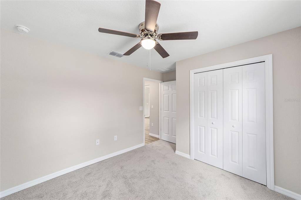 17590 Southwest 112th Place Dunnellon, FL 34432 - Photo 21 of 31 a view of empty room with wooden floor