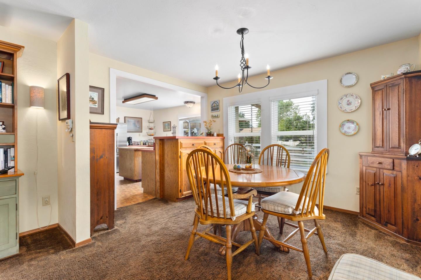 875 Amesti Road Watsonville, CA 95076 - Photo 11 of 52 a view of a dining room with furniture window and wooden floor