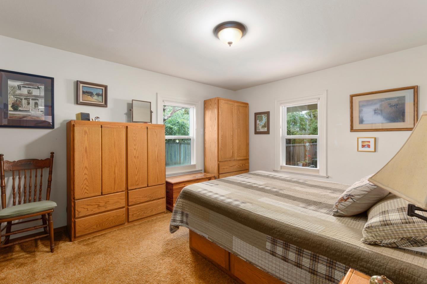 875 Amesti Road Watsonville, CA 95076 - Photo 16 of 52 a bedroom with a bed and a refrigerator