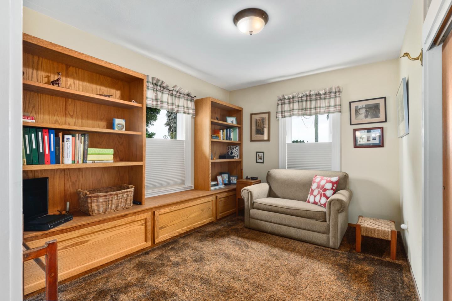 875 Amesti Road Watsonville, CA 95076 - Photo 18 of 52 a living room with furniture cabinets and window