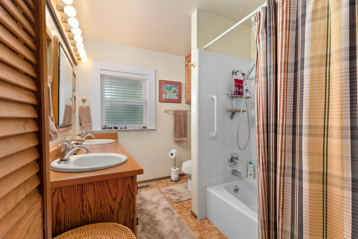 875 Amesti Road Watsonville, CA 95076 - Photo 20 of 52 a bathroom with a tub sink and mirror